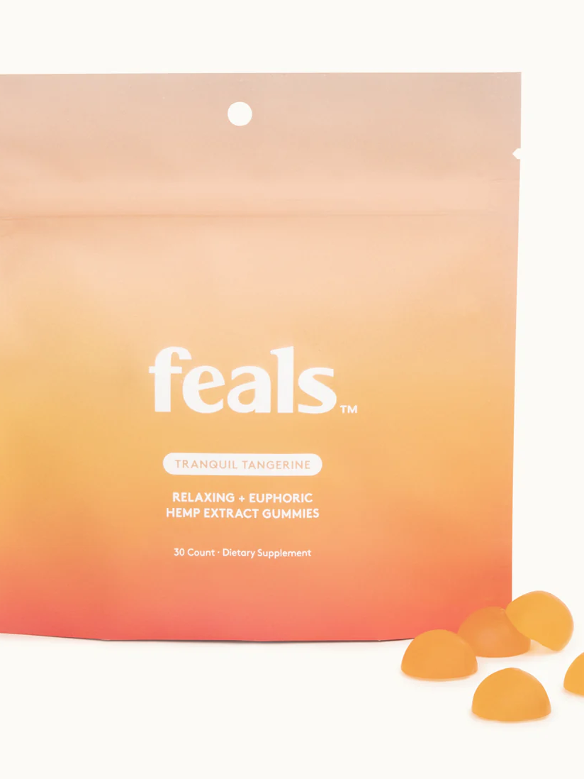 A feals tranquil tangerine-branded pouch containing 30 hemp extract gummies for relaxation and euphoria, displayed with several gummies outside the pouch.
