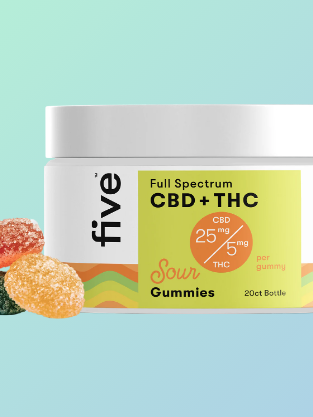 A container of full-spectrum cbd + thc sour gummies with a label indicating 25mg cbd and 2mg thc per gummy, surrounded by scattered gummies of various colors.