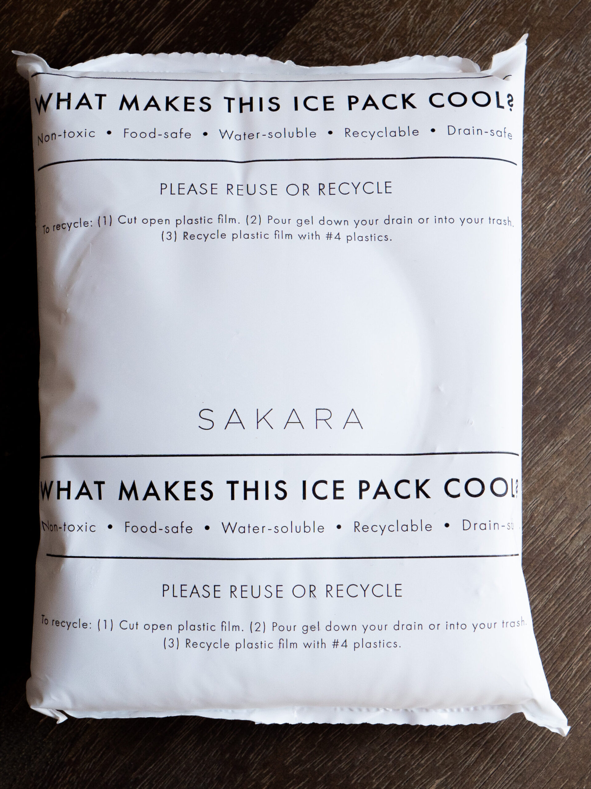 A white Sakara ice pack with recycling instructions and safety information printed in black text on the front.