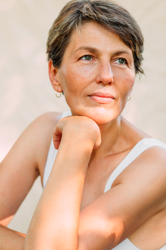 Portrait of a beautiful woman in her 50s captured outdoors