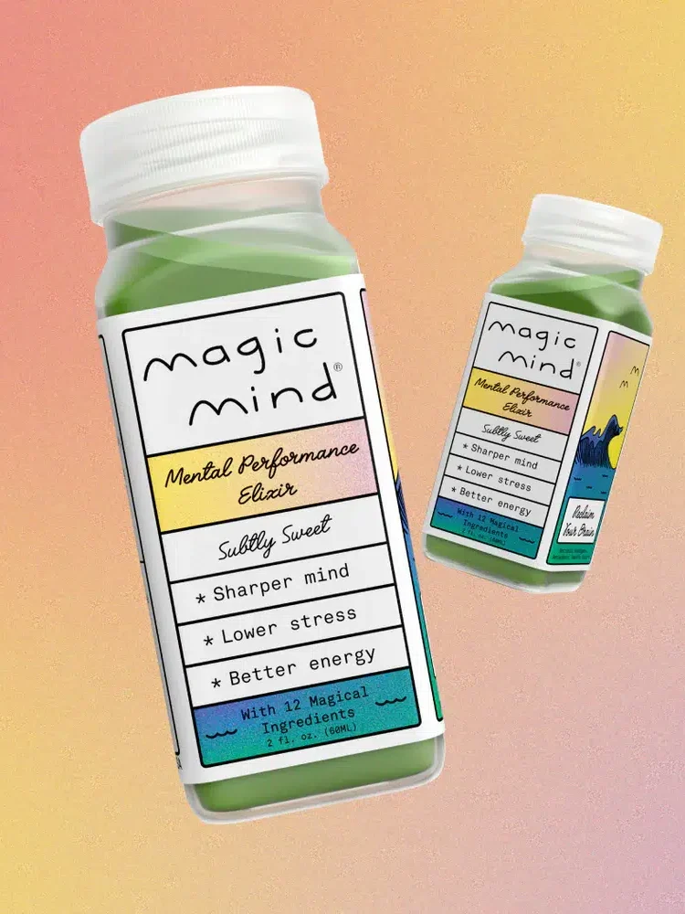 Two bottles of "Magic Mind Mental Performance Elixir” against a gradient background, labeled with benefits such as a sharper mind, lower stress, and better energy.