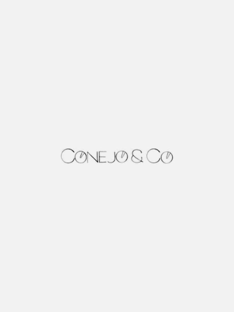 The image shows the text "Conejo & Co" in a minimalist, black font against a white background.