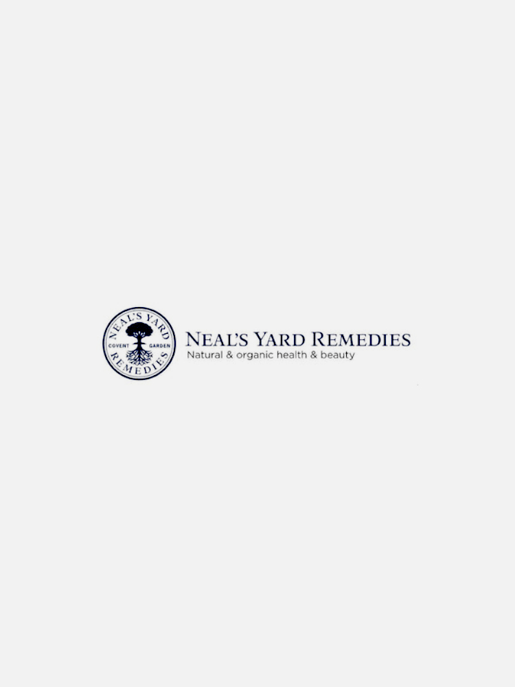 Logo of Neal's Yard Remedies, featuring an illustration of a tree and text that reads "Natural & organic health & beauty.