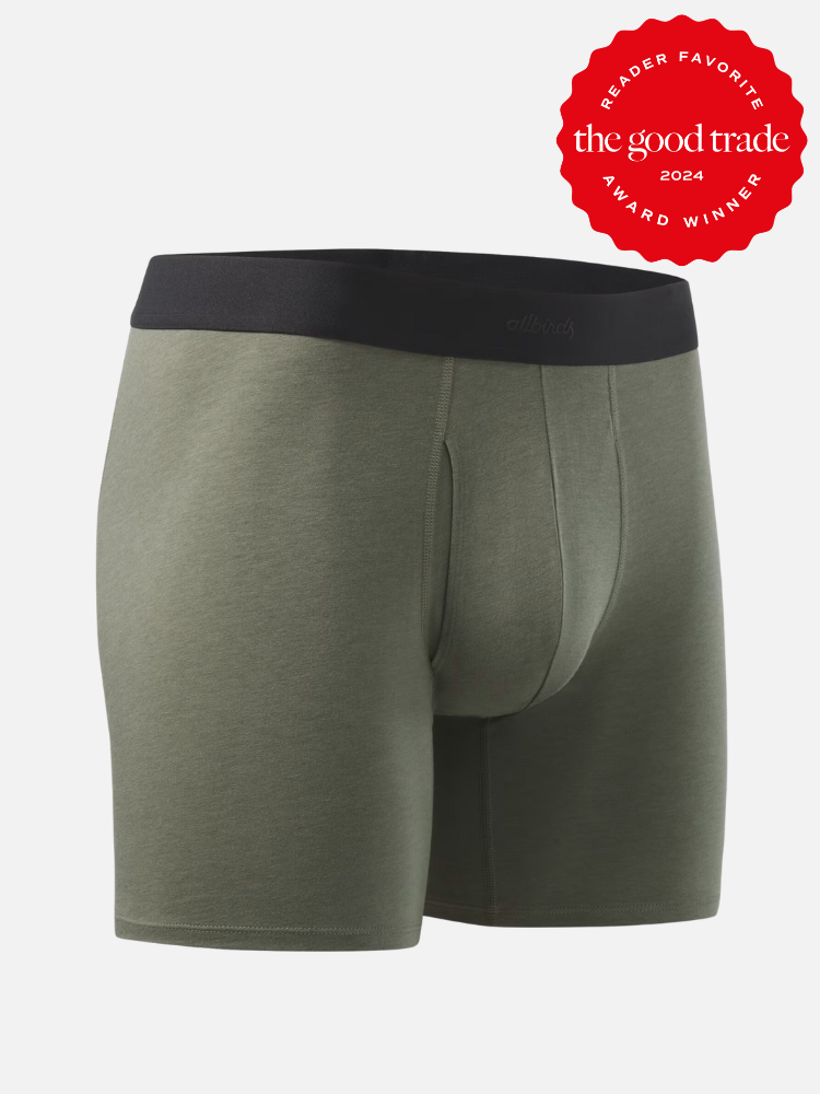 Green men's boxer briefs with a black waistband. A red circular badge on the upper right corner reads "The Good Trade Reader Favorite Award Winner 2024.