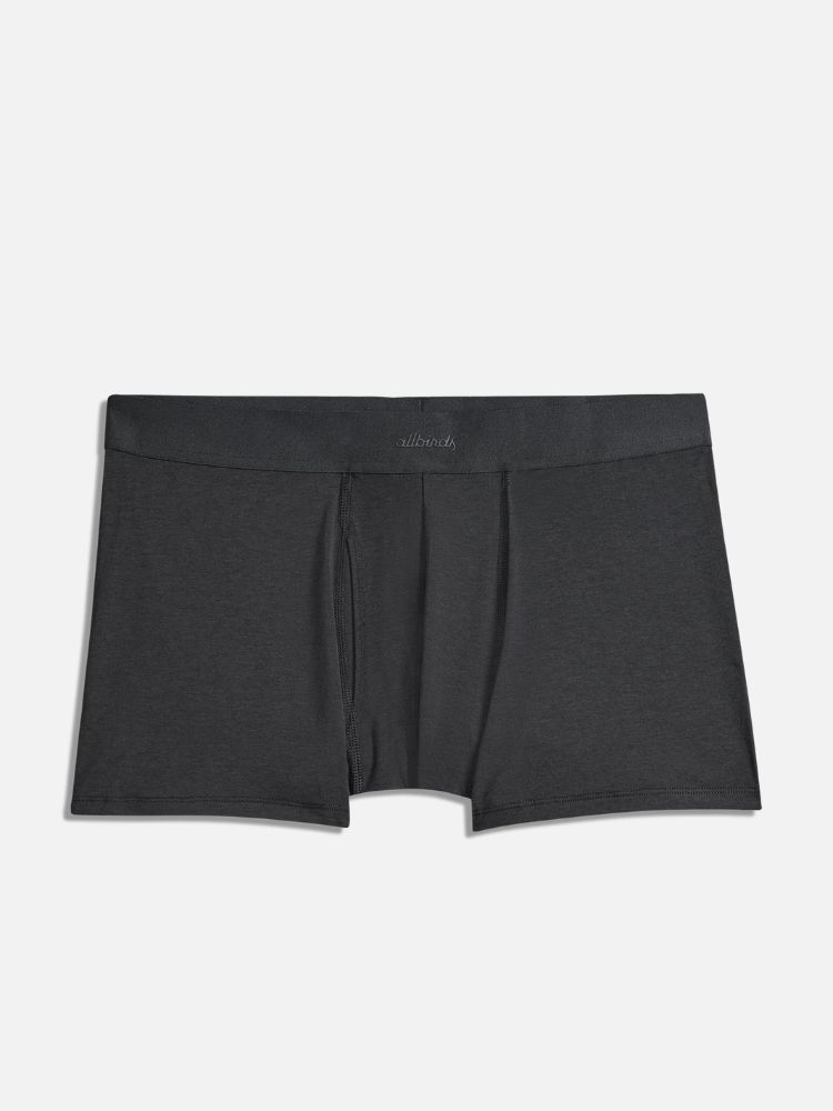 A pair of black men's boxer briefs with a waistband displaying the brand name "allbirds" in subtle lettering. The fabric appears smooth and fitted.