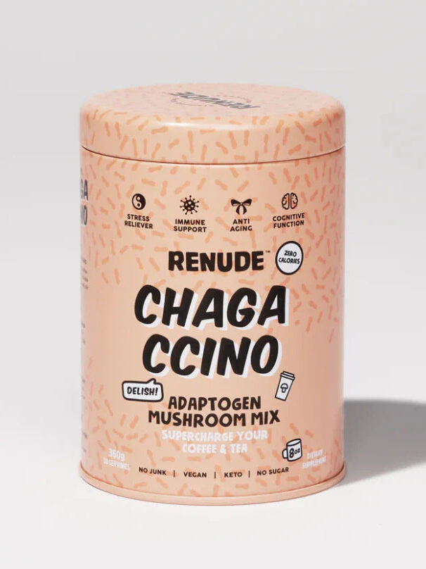 A cylindrical container of Renude Chagaccino Adaptogen Mushroom Mix. The label highlights benefits such as stress relief, immune support, and cognitive function, along with the product being keto and vegan.