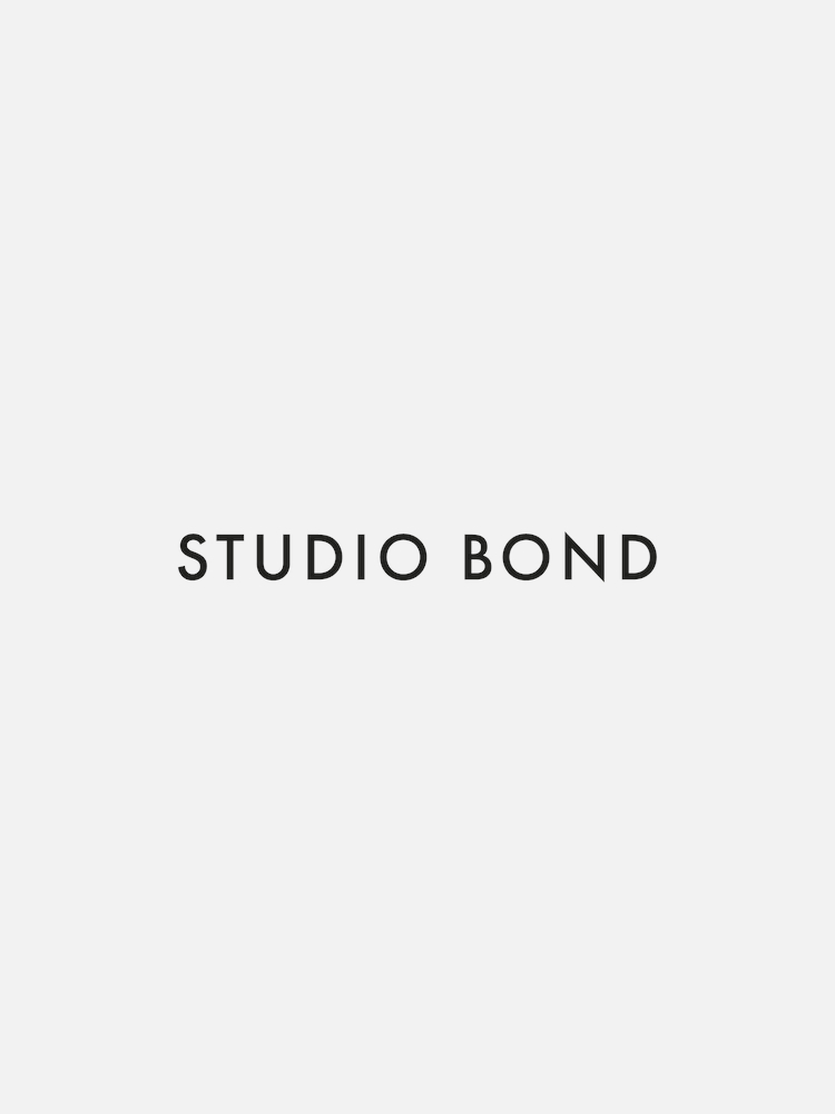 A white background with the words "STUDIO BOND" centered in black, uppercase font.