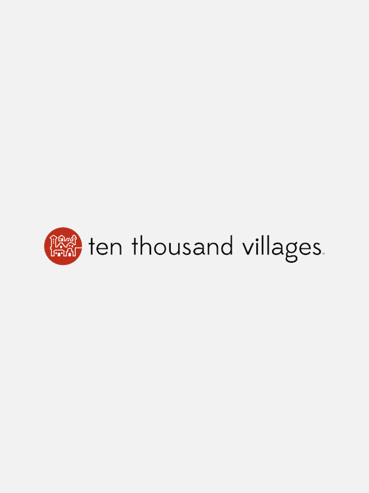 Logo of Ten Thousand Villages with a white background. The logo includes a red circular symbol with a line drawing of three houses inside, followed by the text "ten thousand villages.