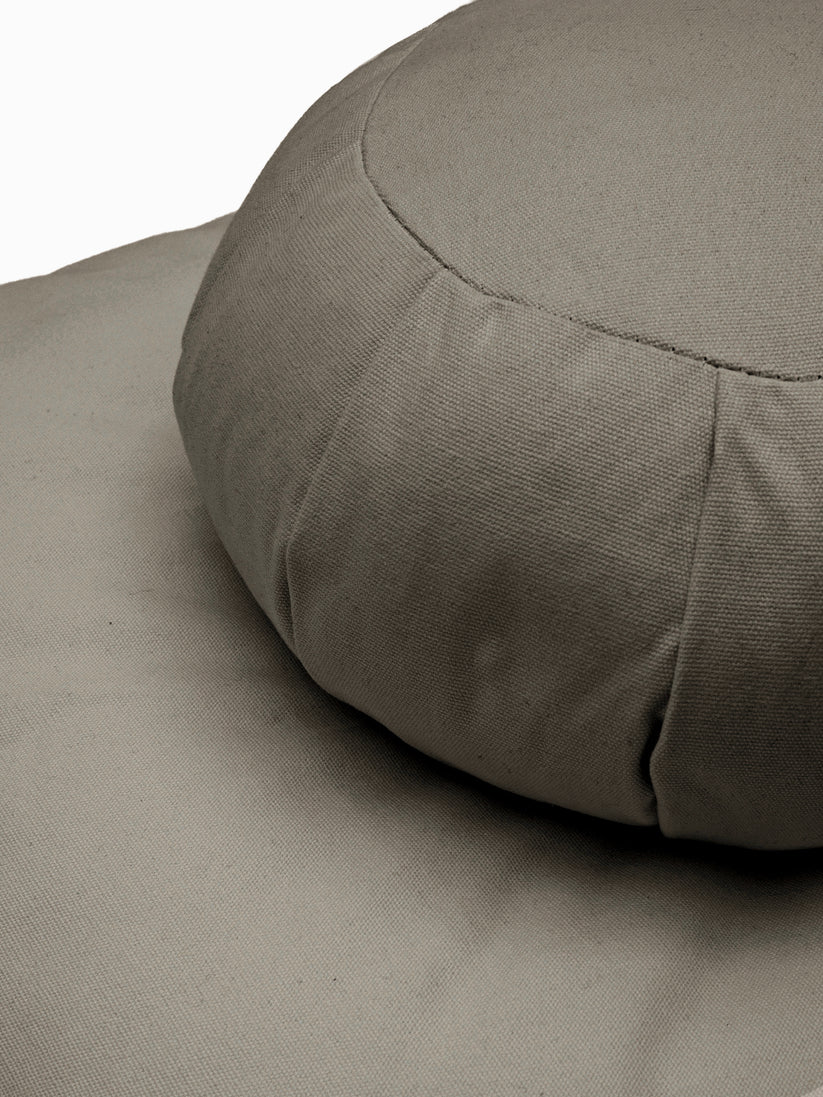 The Practice Meditation Cushion in grey. 