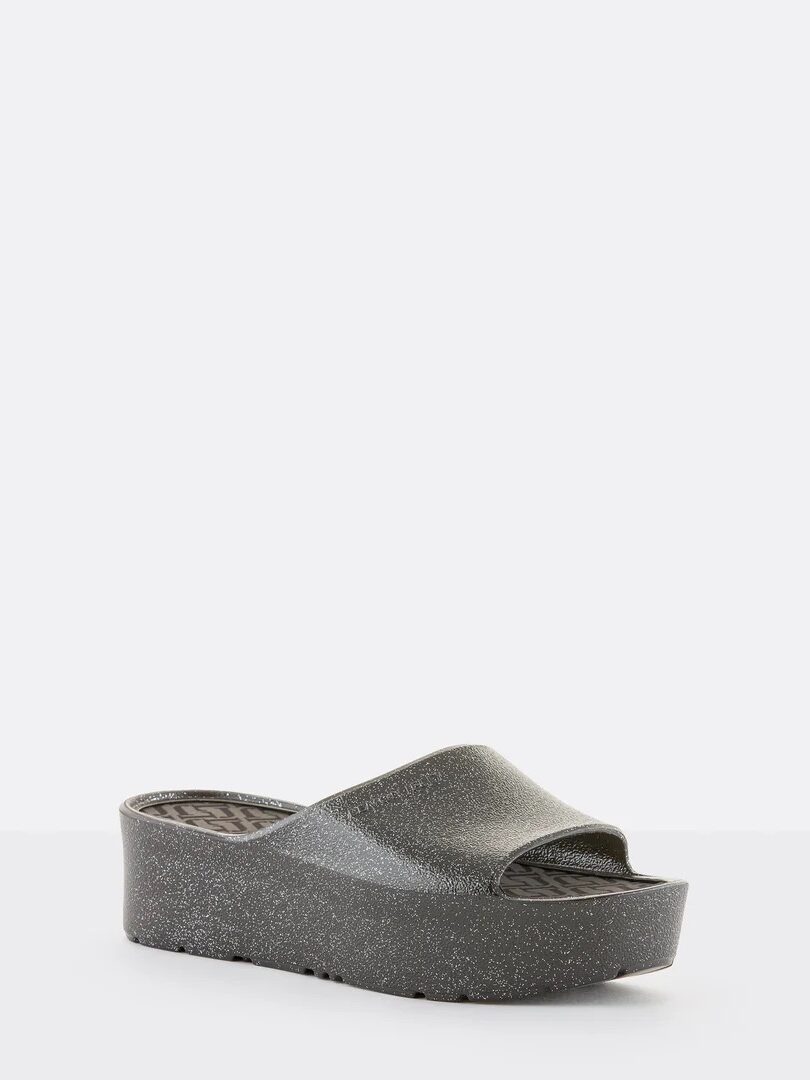 A single black platform slide sandal with a glittery finish, an open toe, and a thick sole, displayed against a plain white background.