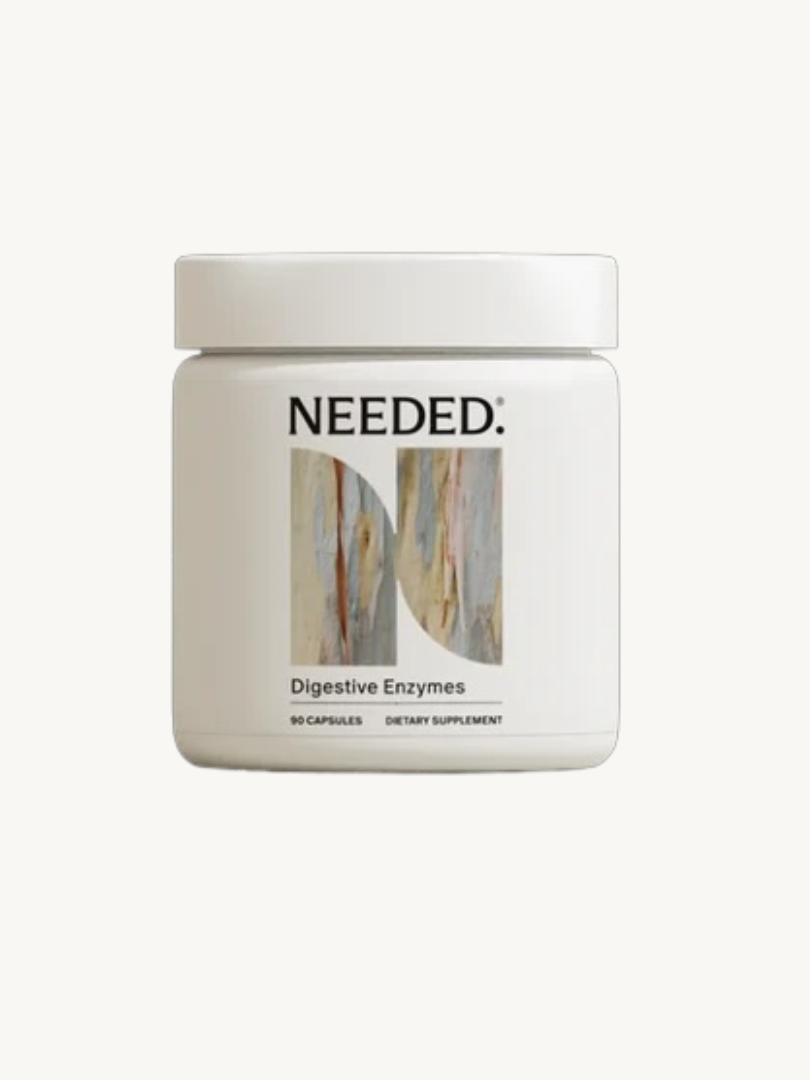 White container labeled "NEEDED. Digestive Enzymes" with abstract design; contains 90 capsules of dietary supplement.