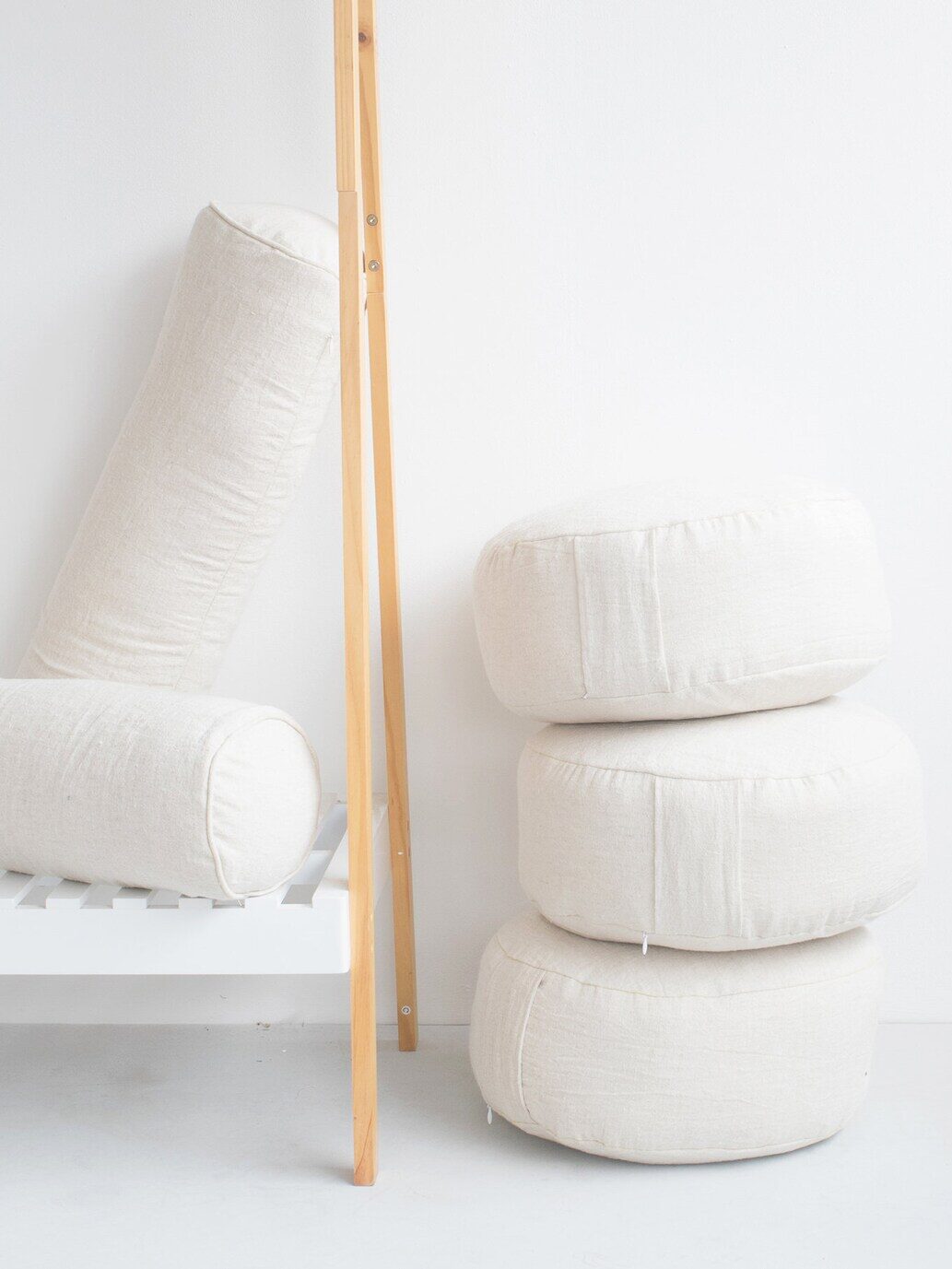 Lanna Passa meditation cushions stacked on one another. 