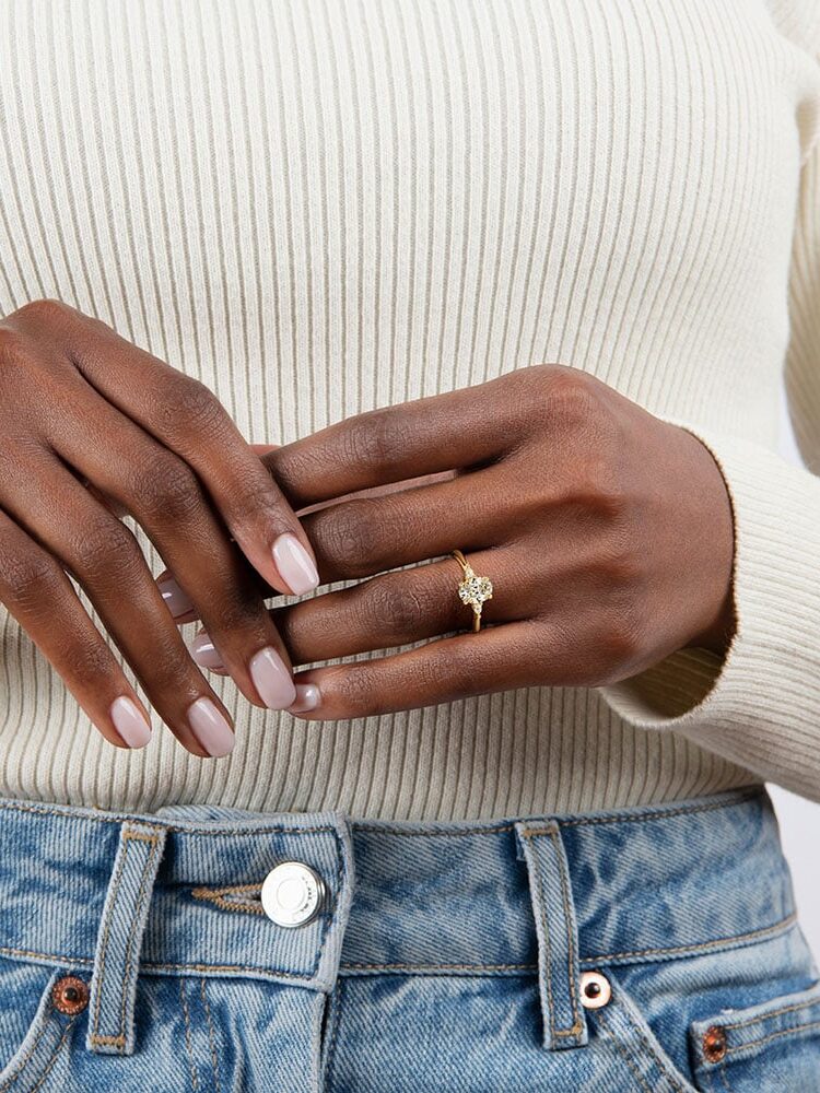 A model wearing a Brilliant Earth engagement ring.