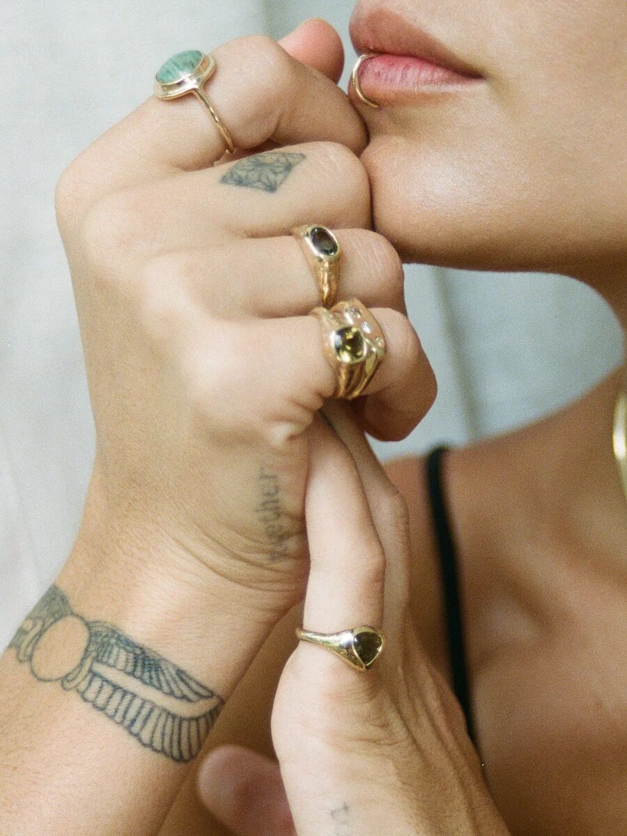 A model wearing a Catori Life ring.