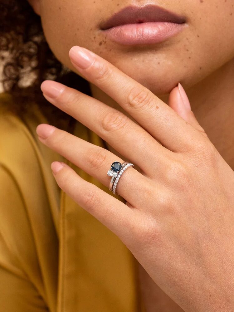 A model wearing a Mejuri engagement ring.