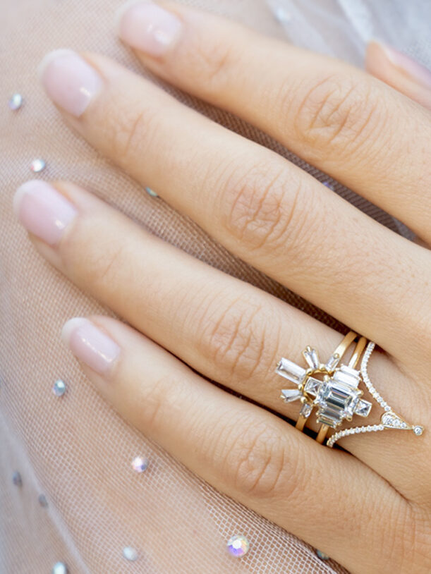 A model wearing a Sofia Kaman engagement ring.