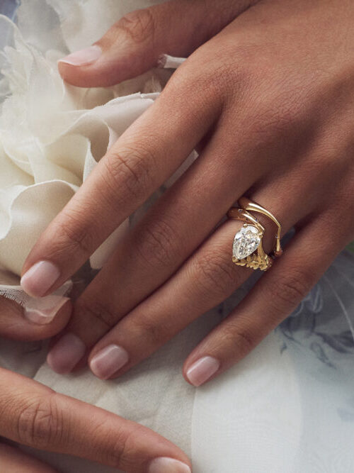 A model wearing a Taylor & Hart engagement ring.