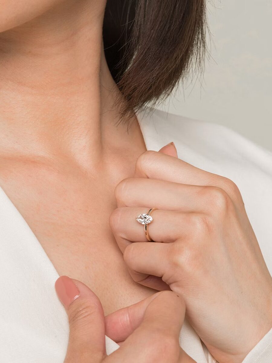 A model wearing a Vrai engagement ring.