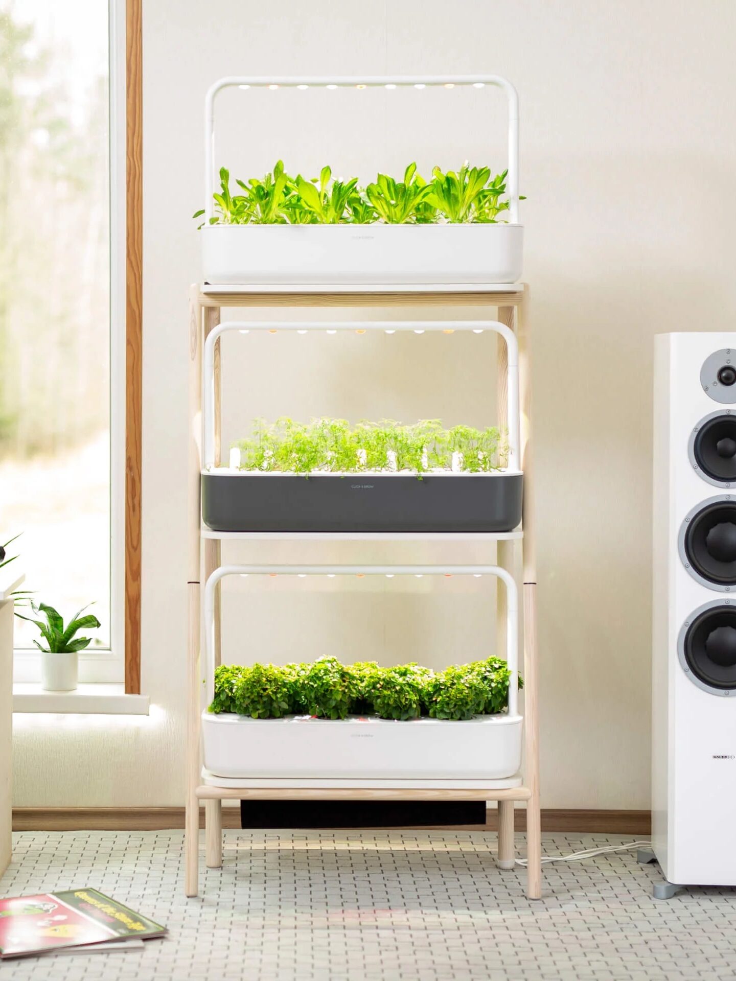 A hydroponic vertical garden in a room, from Click and Grow. 