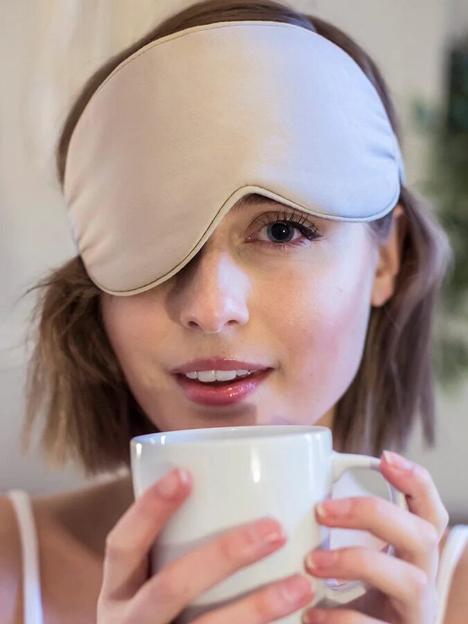 A model wearing Simply Organic Bamboo's sleep mask. 