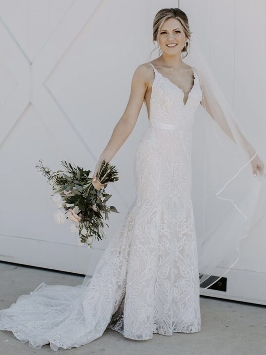 A model wearing a wedding dress from Borrowing Magnolia.