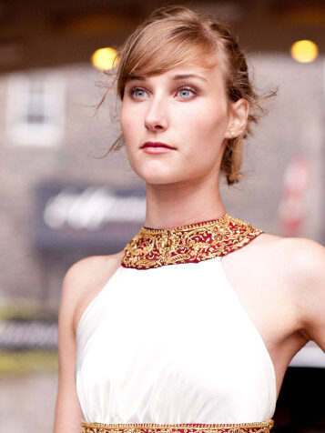 A model wearing a Katherine Feiel wedding dress.