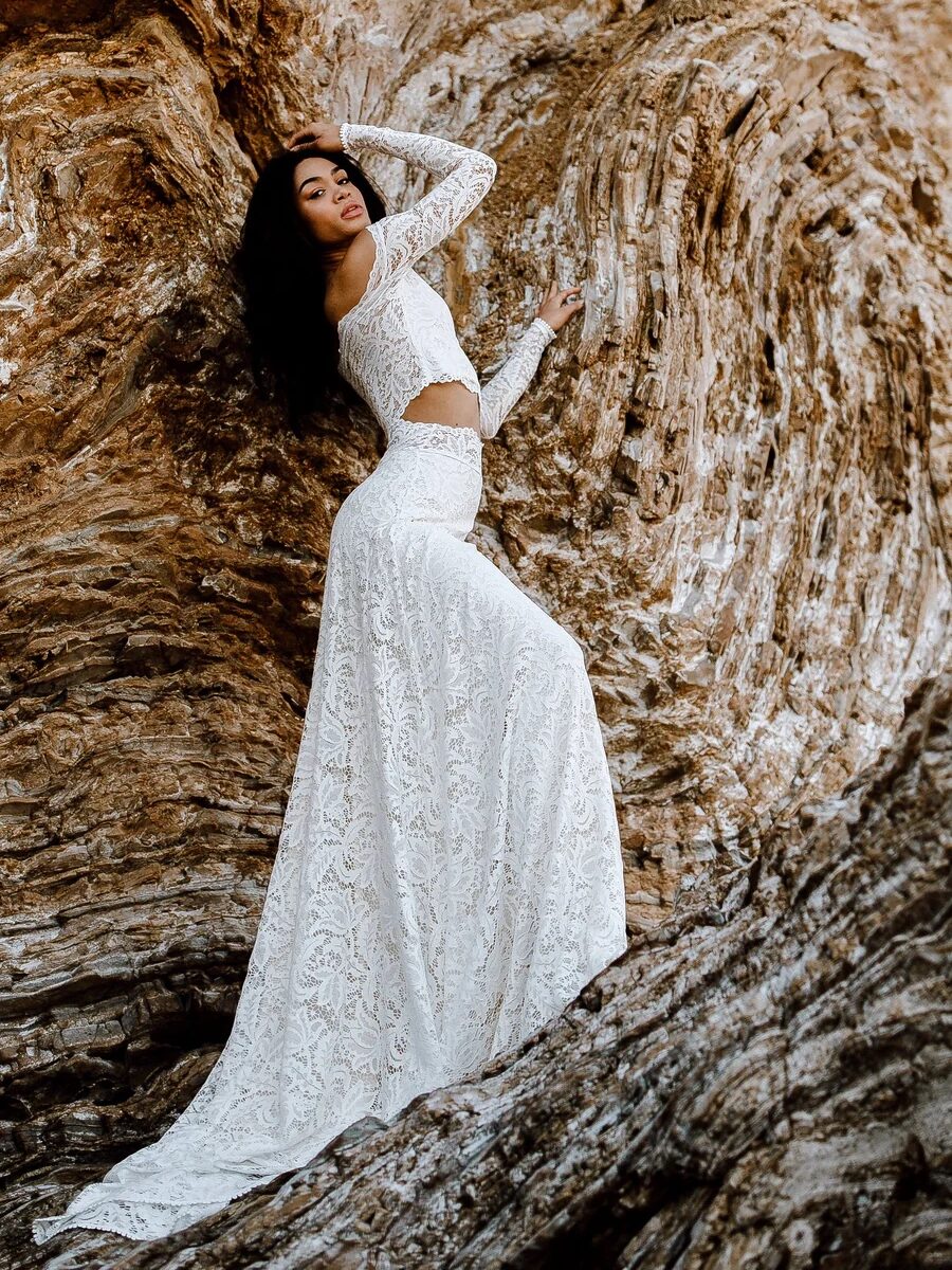 A model wearing a wedding dress from Wear Your Love.