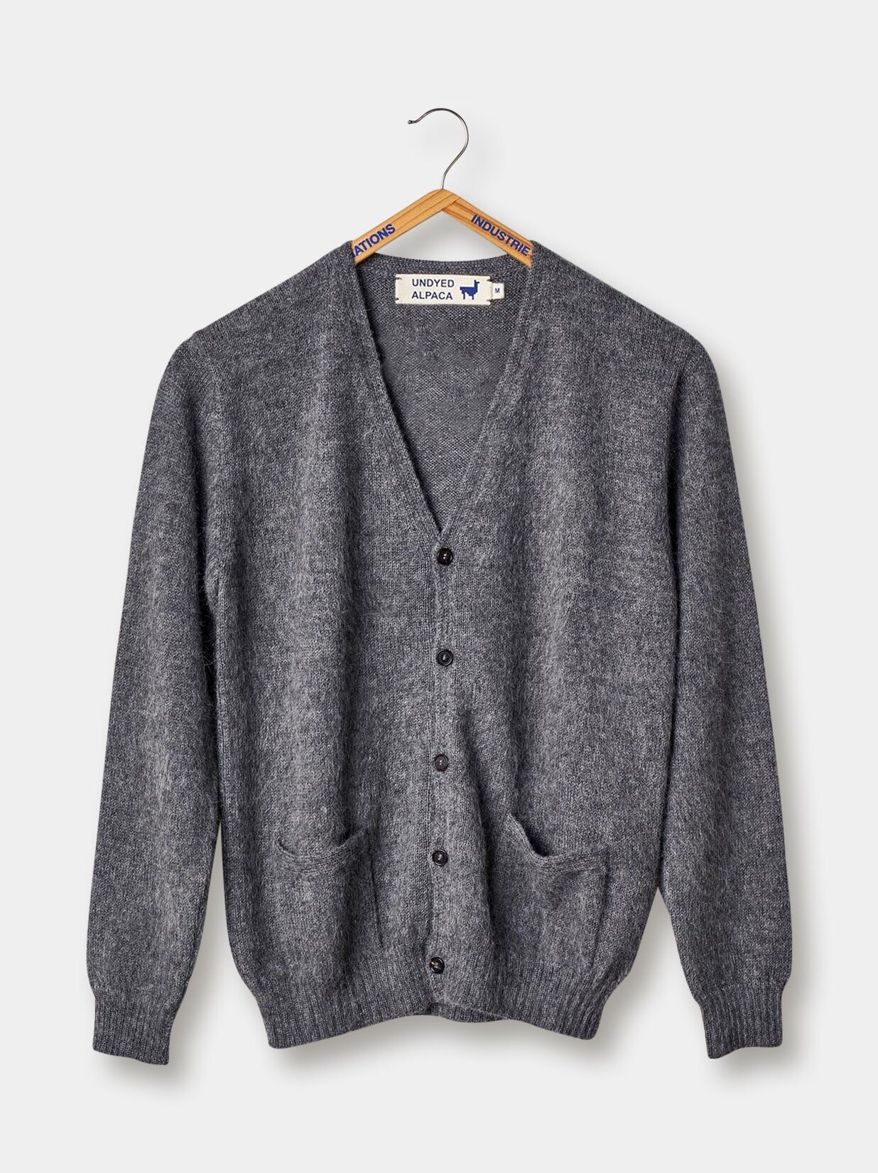 A dark grey cardigan from Industry of all Nations.