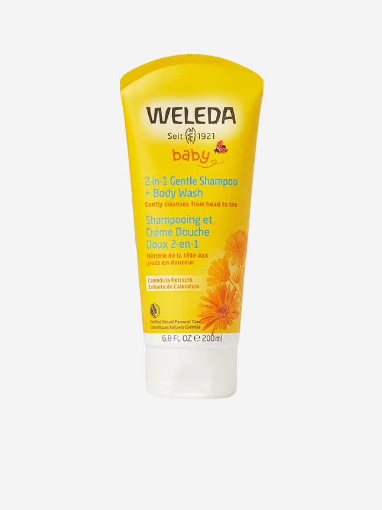 Bottle of Weleda Baby 2-in-1 Gentle Shampoo and Body Wash, 6.8 FL OZ, with calendula extracts, in a yellow, orange, and white packaging.