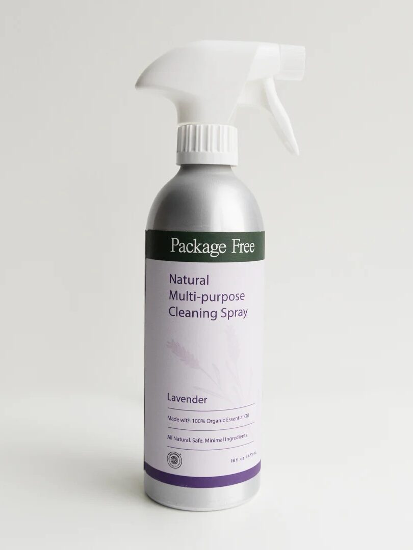 A silver spray bottle labeled "Package Free Natural Multi-purpose Cleaning Spray, Lavender" on a white background.