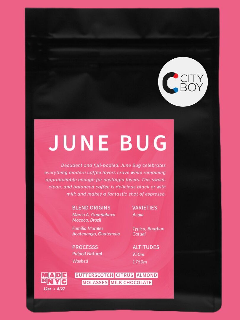 Coffee bag labeled "June Bug" with details on blend origins, varieties, process, and flavor notes on a pink background.