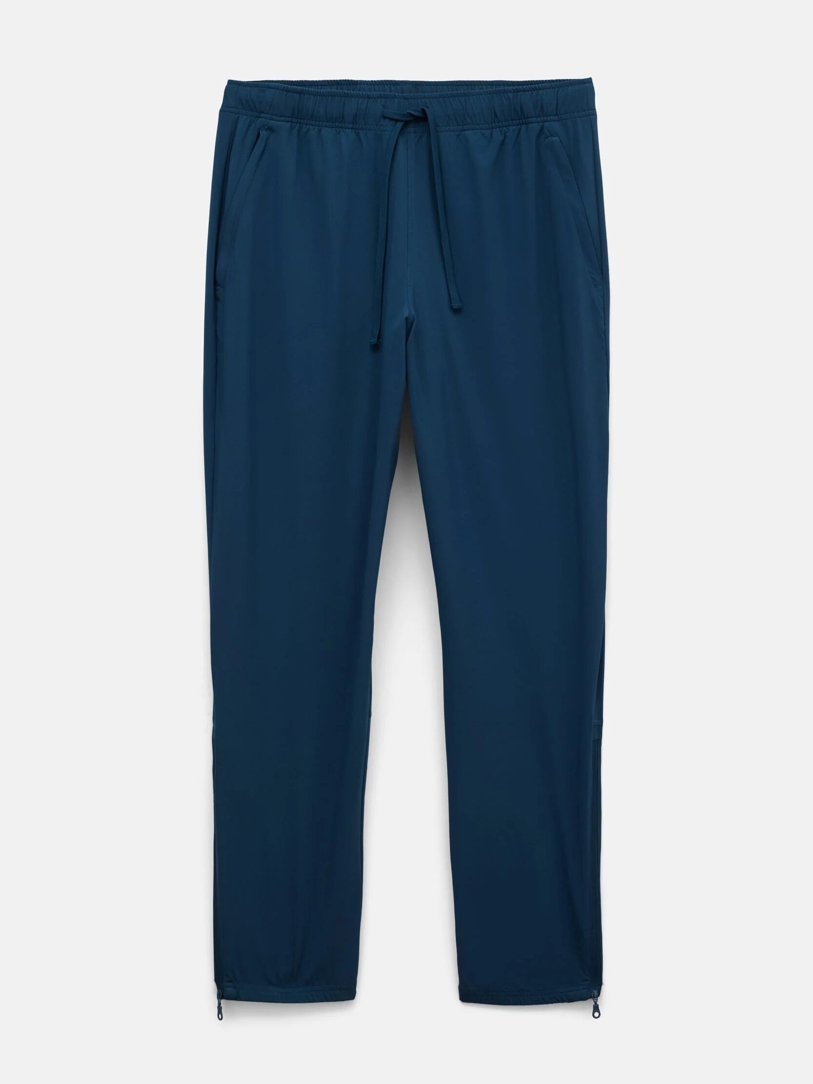 Dark blue drawstring pants with an elastic waistband and zippered cuffs on a plain white background.